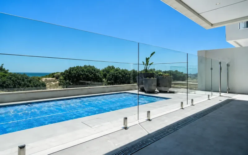 Swimming pool glass surrounding